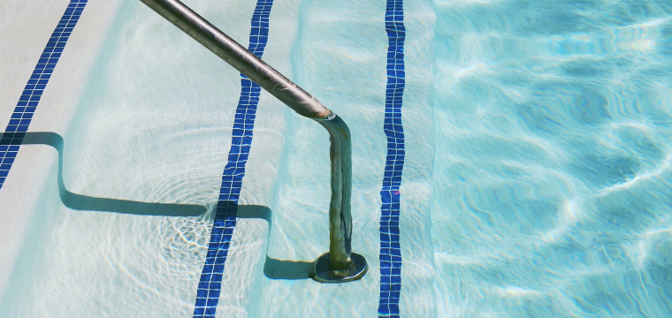 Practicing safe swimming in this crystal clear pool