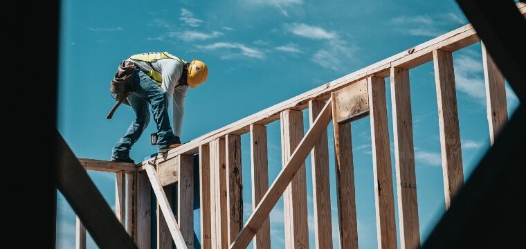 Man About to Fall of of House Frame in Construction Site Accidents